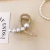 Nuevo pasador de perlas de alta gama para mujer, pinza para el pelo con temperamento, pinza para coleta media, pinza de tiburón joker, accesorios para el cabello al por mayor