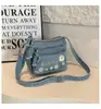 Bolso de Mezclilla Lavada Casual Retro Simple 2026 Nuevo Estilo Multibolsillos con Cremallera Bordado Mini Bolso Cruzado de Moda