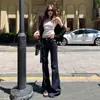 Estilo Urbano Americano 2026 Chica Atractiva Jeans Elásticos Micro-Bota para Mujer Diseño Adelgazante Pantalones de Campana Versátiles Modernos