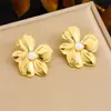 Pendientes de perlas texturizadas con lazo floral transfronterizos europeos y americanos para mujer, lujo ligero, estilo metálico de alta gama, pendientes de moda y únicos