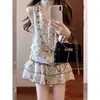 En stock Conjunto de dos piezas de top halter y falda corta estilo dama francesa para joven, nuevo, shorts de verano, ropa casual
