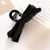 Pinza para el pelo con lazo elegante estilo francés, tamaño mediano, blanco y negro, sensación de lujo ligero y alta gama, pasador para peinado de moño de mujer