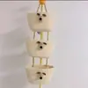 En stock canasta de almacenamiento tejida con cuerda de algodón decoración caricatura Sanrio canasta colgante de tres niveles cosméticos artículos varios canasta de pared