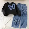 Sudadera Blanca de Manga Larga con Estampado de Moño Nuevo de Otoño para Exportación Transfronteriza con Jeans y Pantalones Traje Casual