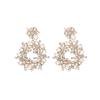 Brincos de flor de liga metálica com diamantes exagerados e criativos europeus e americanos brincos de diamantes coloridos elegantes e luxuosos brincos transfronteiriços para mulheres