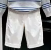 Suéter de punto tipo polo a rayas grises bordado con oso, estilo coreano para niños, novedad otoño 2026, y pantalones rectos para niños