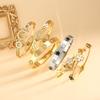 Pulsera de Acero de Titanio con Diseño Micro-incrustado Finamente Pulido de Moda Europea y Americana Transfronteriza para Mujer Recortada Flor de Cuatro Hojas de Alto Brillo Lujo