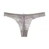 Tanga transpirable para mujer estilo puro deseo con encaje europeo y americano, lencería sexy y de moda para mujer, malla de melocotón en las nalgas, cintura baja