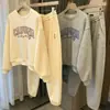 Conjunto Esportivo Casual para Mulheres, Simples 2026 Primavera e Outono Nova Moda Estampado Blusão Solto e Calça Longa Conjunto de Duas Peças