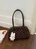 Bolso de bolos de nicho estilo coreano para mujer, nuevo modelo 2026, lunares, gran capacidad, de un solo hombro, adecuado para el uso diario, bolso almohada moderno y a la moda