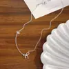 Collar de Lazo Plateado para Mujer 2026 Nuevo Estilo Cadena para Clavícula de Alta Gama Lujo Ligero Diseño de Nicho Accesorio de Cadena para el Cuello