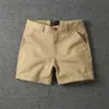 Calças casuais americanas elásticas de três quartos para homens, shorts de verão modernos slim fit de perna reta para atividades ao ar livre, calças de trabalho esportivas de quatro quartos