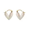 Pendientes de Gota de Aceite para Mujer 2023 Nueva Moda de Alto Nivel Corazón de Melocotón Pendientes Diseño de Nicho Lujo Ligero Tachuelas Pendientes Estilo Occidental