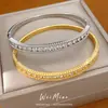 Pulsera de doble capa circular hueca con cierre chapado en oro real de 18 quilates con circonitas, accesorio de mano exquisito y moderno, joyería de nicho de lujo ligero