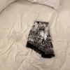 Pijama de camisola de encaje estilo francés para mujer, nuevo modelo verano 2026, estampado de pintura a tinta, seda de hielo fina con copas en el pecho, ropa de casa