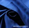 Fábrica de origen tela pongee jacquard de rejilla Yin-Yang 50D impermeable ecológica sin flúor para chaquetas deportivas de estudiante para exteriores