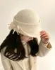 Fábrica de sombreros de lana 100% australiana transfronteriza al por mayor sombrero de fieltro elegante con ala, lazo tridimensional, perla, otoño e invierno