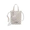 Bolsa minimalista de moda transfronteiriça para mulheres, nova bolsa de ombro versátil com design de nicho, bolsa de ombro cruzado casual tipo balde