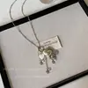 Collar Colgante de Corazón Plateado con Forma de Cachorro del Mismo Estilo de Blogger Coreana para Mujer, Cadena Larga de Suéter de Accesorios de Gama Alta de Nicho para Otoño e Invierno