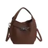 Bolsas para Mulheres Nova Moda Coreana de Nicho Tendência Bolsa de Mão tipo Balde Texturizada Casual de Alto Padrão para o Dia a Dia Bolsa Transversal