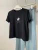 Camiseta base suave de algodón Xinjiang para mujer, estilo coreano con estampado de cachorro de dibujos animados, cepillada, de manga corta, juvenil, versátil, cuello redondo, para principios de otoño