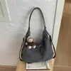 Comercio Electrónico Transfronterizo Bolsas Tejidas de Nicho para Mujer Estilo Retro Europeo Americano para Viajes Diarios Bolso de Hombro Único Tipo Cubo Sensación de Alta Gama Bolso Cruzado Tote