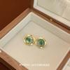 Pendientes de piedra de ojo de gato verde Dongdaemun de Corea del Sur, diseño de nicho femenino, temperamento de alta gama, pendientes sencillos que combinan con todo.