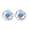 Pendientes de plata de ley S999 para mujer con diamante giratorio de moda, versión coreana de pendientes retro de diamante y rosa, fabricantes de pendientes al por mayor