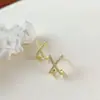 Ouro real galvanoplastia simples requintado pequeno micro embutido brincos cruzados elegante luz de luxo de alta qualidade all-match brincos de brincos para mulheres