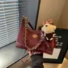 Bolsa de ombro acolchoada com corrente estilo Chanel para mulheres 2026 novo modelo transfronteiriço bolsa de ombro única bolsa transversal bolsa de bolinho versátil