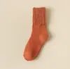 Amazon venta al por mayor transfronteriza comercio exterior calcetines invierno mujer felpa engrosados calcetines de lana color liso calcetines altos mujer calcetines mujer