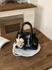 Bolso Cubo Versátil de Mano para Mujer de Comercio Exterior, Nueva Moda Primavera 2025 Bolso de Hombro Versátil con Acabado de Alta Gama, Bolso Cruzado