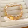 Pulsera patchwork de piedra cuadrada incrustada con diamantes vintage, sensación de lujo ligero de nicho de alta gama, accesorio de mano estilo retro