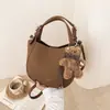 Bolso Cubo de Diseño Nicho Coreano Transfronterizo Moda Otoño/Invierno 2026 Nuevo Versátil Bolso de Hombro Cruzado de Temperamento