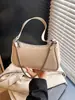 Bolso pequeño transfronterizo estilo retro para mujer, nuevo bolso casual de color liso para otoño 2026, moderno bolso de hombro y cruzado