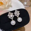 Pendientes de Moda de Aguja de Plata 925 con Cubos de Perla de Venta Caliente Pendientes Dulces de Nicho de Gama Alta Pendientes de Diseño Exquisito