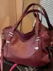 Bolso de Mujer 2026 Primavera Nuevo Estilo Bolso Tote para el Trabajo Retro Europeo y Americano Bolso de Hombro Cruzado de un Solo Hombro Gran Capacidad Bolso Sencillo para el Brazo