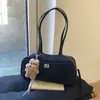 Bolsa Única com Textura para Axila Feminina 2026 Nova Bolsa de Boliche Grande Capacidade Bolsa de Ombro Versátil Bolsa para o Dia a Dia