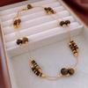 Maillard Faux Tiger Eye Stacked Necklace Outono e Inverno Nicho Retro Woolen Chain Simple All-match High-end Necklace