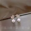 Diseño de nicho aretes de perla y circón retro francés de alta calidad lujo ligero estilo coreano elegante aguja de plata de ley aretes adorables