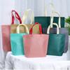 Bolso de Hombro Popular en Internet de Tela No Tejida Tienda de Ropa Bolso Tridimensional Abrigo Chaqueta de Plumas Bolso Grueso con Logotipo