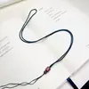 Cordón de collar tejido de jade hecho a mano al por mayor con colgante de oro ajustable y cuentas de barril de sándalo