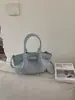 Bolsa de cubo de moda al por mayor para comercio exterior, nuevo modelo 2026, bolso de hombro versátil, bolso cruzado de alto valor