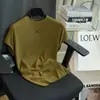 Moda Estilo Francés Lyocell Adelgazante Skinny Textura Corteza Borde Arrugado Cuello Redondo Manga Corta Camiseta de Punto Top Mujer