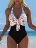 Traje de baño de una pieza europeo y americano para mujer, escote en V profundo, con tiras, ajustado, sexy, con cortes, adelgazante, nuevo estilo 2027, para vacaciones, aguas termales, traje de baño