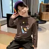 Camiseta Base de Felpa Cepillada para Niños Camiseta Casual de Cuello Semi-Alto Otoño/Invierno 2026 Nueva Versátil para Niños Medianos y Mayores