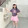 Conjunto de Verano para Niñas 2026 Elegante Moda Infantil Camiseta de Dibujos Animados para Bebé con Cordón Mangas Cortas Falda Corta Conjunto de Dos Piezas