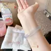 Pulsera ojo de gato morado taro de sentido avanzado rosa champán oro vivo tienda atracciones turísticas joyería de mano al por mayor