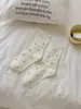 Calcetines blancos para niñas y mujeres, otoño e invierno, calcetines de media pantorrilla de lunares, calcetines holgados estilo JK Lolita japonés, calcetines largos de rayas finas con encaje estilo coreano