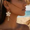 Pendientes de aro grandes de flor francesa de cinco pétalos, flor cruzada, lujo ligero, incrustaciones de diamantes, diseño de borla de doble diamante, pendientes largos de borla
